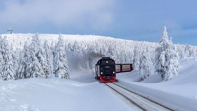 on the way in the winter landscape through the beautiful harz